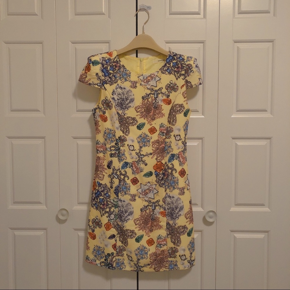 Diamond print dress with shoulder pads